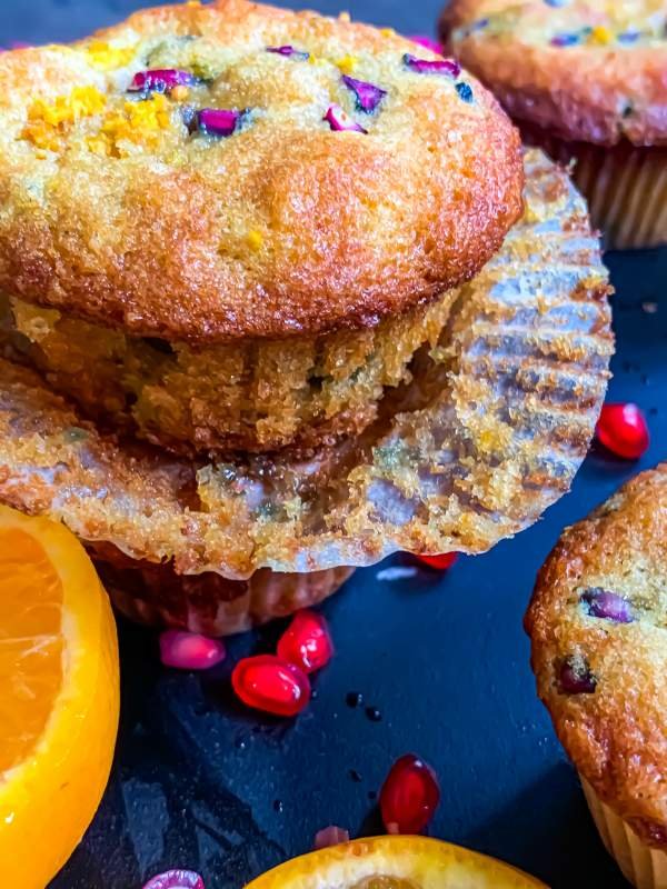Orange Pomegranate Muffins with the cupcake liner opened