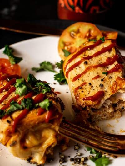 Cheesy Pizza Stuffed Chicken Roll-Ups side view