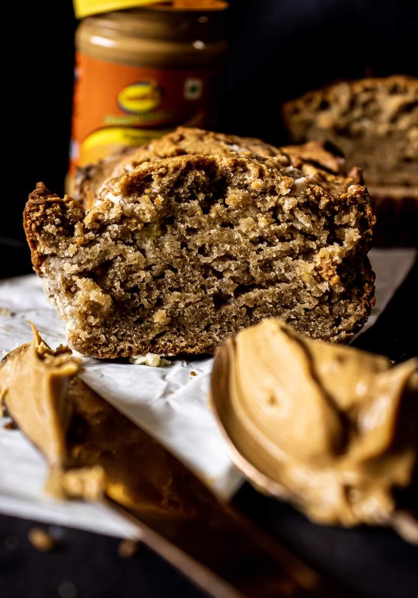 Peanut Butter Banana Bread with Peanut butter on a spoon