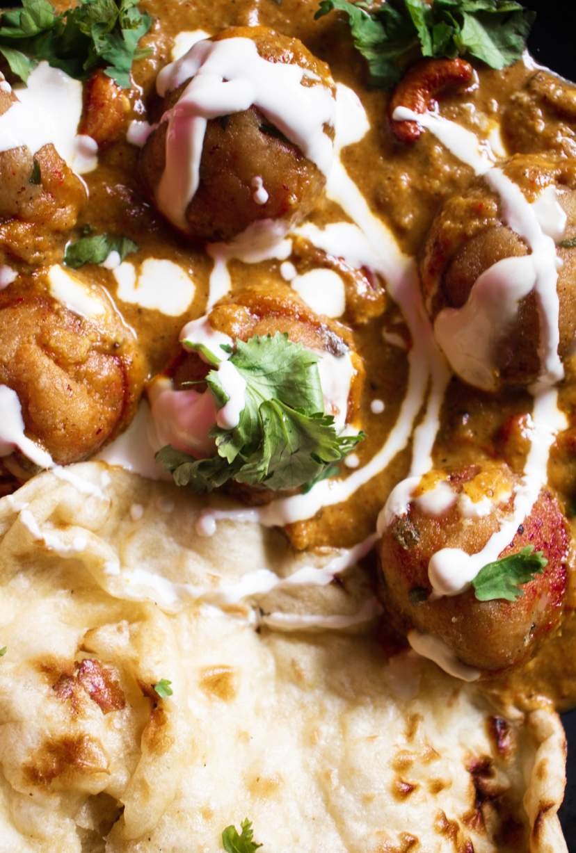 malai kofta with fresh cream and naan