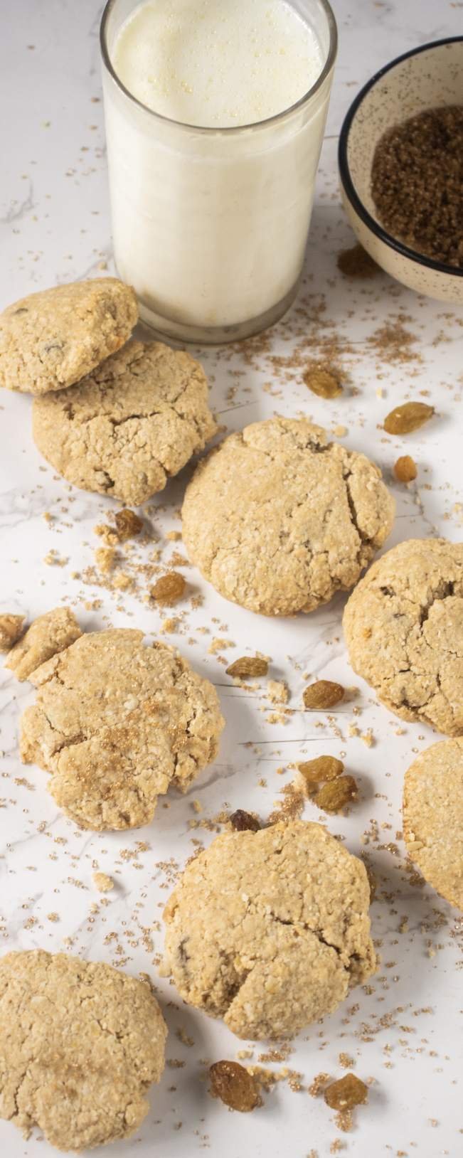 Flourless Oatmeal Raisin Cookies with glass of milk and raisins